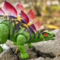 WOOPIE Távirányítós Stegosaurus dinoszaurusz világító szemekkel, hanghatásokkal és táncoló funkcióval