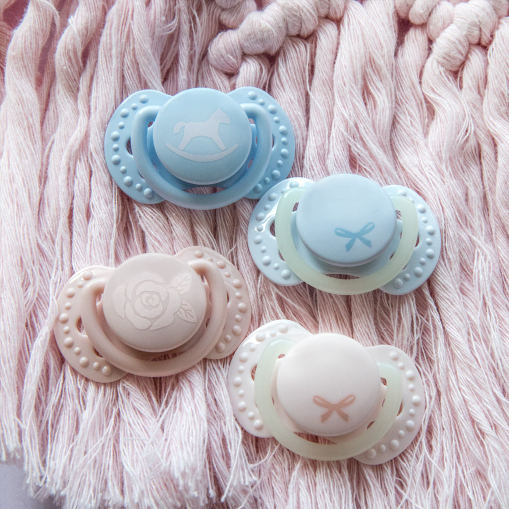 LOVI Világító mini szilikon dinamikus cumi BABY SHOWER 0-2hó 2db lány